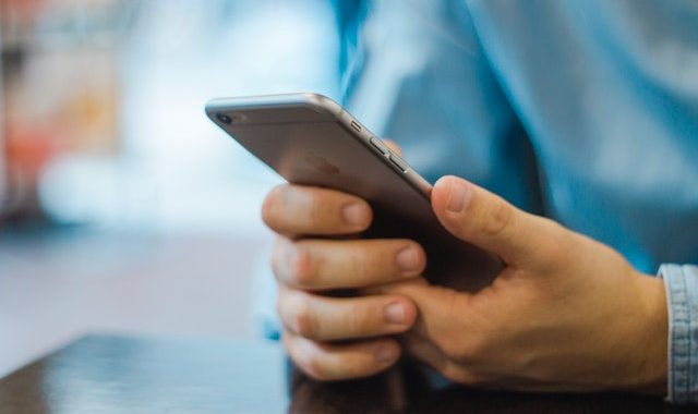 Close up of an iphone in someone's hands